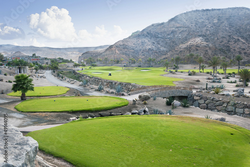 Photo: Golf course fairway at tropical resort, Canary Islands, Spain Golf course fairway at tropical resort, Canary Islands, Spain