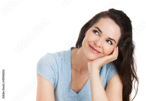 Photo: Close-up portrait of thinking woman Close-up portrait of thinking woman
