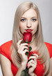 blonde woman with rose