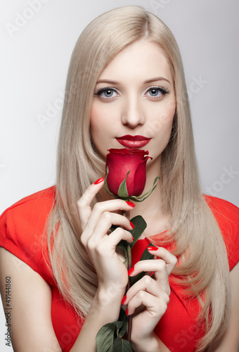 Photo: blonde woman with rose blonde woman with rose
