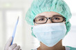 Doctor or nurse with mask and cap