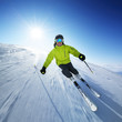 Skier on piste in high mountains Skier on piste in high mountains