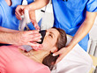 Patient wearing anesthesia mask at hospital.