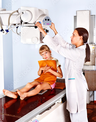 Photo: Little girl with doctor radiologist. Little girl with doctor radiologist.