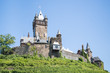Photo: Cochem castle in Germany, surrounded by vineyards Cochem castle in Germany, surrounded by vineyards