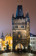 stare Mesto Tower from the Charles Bridge at night, Prague.