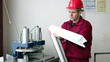 Worker Checking Quality of Weld