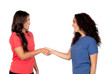 Photo: Couple of friends shaking hands Couple of friends shaking hands