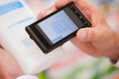 Shopper scanning barcode on product