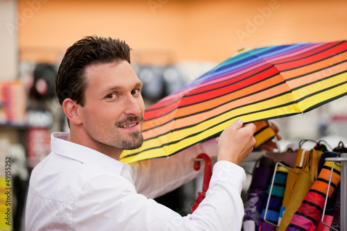 Photo: Shopper buying in supermarket Shopper buying in supermarket