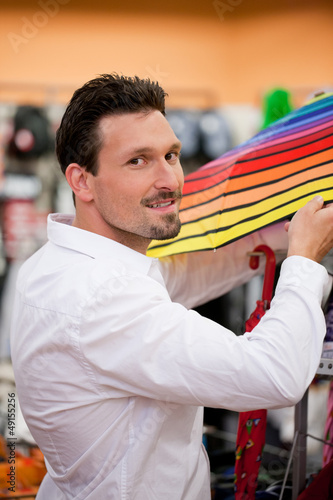Photo: Shopper buying in supermarket Shopper buying in supermarket