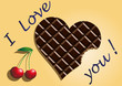 chocolate heart with cherries and the words I love you