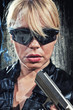 woman holding up her weapon