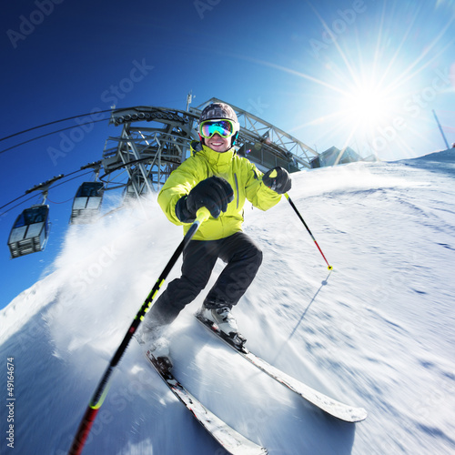 Photo: Skier on pise in high mountains Skier on pise in high mountains
