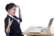 Photo: Surprised woman looking in screen of laptop Surprised woman looking in screen of laptop