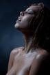 Foto: Portrait of a girl's face which water flows Portrait of a girl's face which water flows