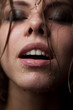 Foto: Portrait of a girl's face which water flows Portrait of a girl's face which water flows