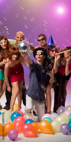 Photo: young caucasian people partying and celebrating young caucasian people partying and celebrating