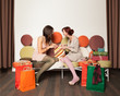 girls with shopping bags laughing