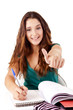 Photo: Portrait of a young happy student doing thumbs up Portrait of a young happy student doing thumbs up