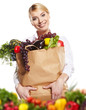 Young woman with a grocery shopping bag. Isolated on white backg