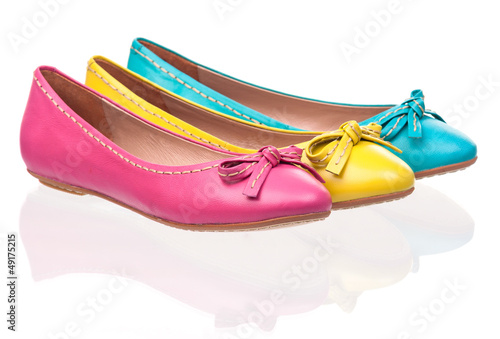 Photo: Three different female pumps over white Three different female pumps over white