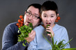 Photo: Dad and son with vegetables Dad and son with vegetables