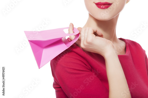 Photo: Women in red dress with little shopping bags Women in red dress with little shopping bags