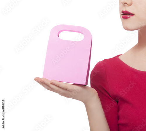 Photo: Women in red dress with little shopping bag Women in red dress with little shopping bag