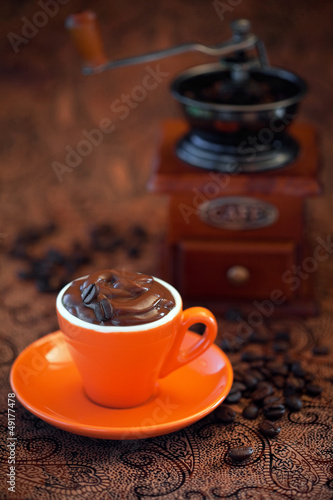 Photo: Chocolate mousse in coffee cup, selective focus Chocolate mousse in coffee cup, selective focus