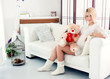 pregnant girl hugging a teddy bear