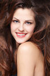Photo: Woman with long brown hairs Woman with long brown hairs
