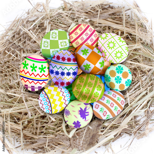 Photo: Colorful easter eggs in nest Colorful easter eggs in nest
