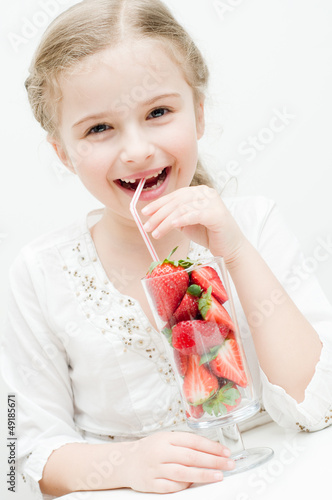 Photo: Strawberry time - lovely girl with fresh strawberries Strawberry time - lovely girl with fresh strawberries