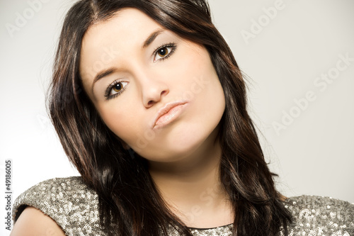 Photo: Undecided contemplative woman Undecided contemplative woman