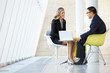 Businessman And Businesswoman Meeting In Modern Office
