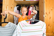 Family - child in front of her closet or wardrobe
