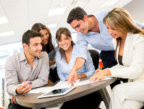 Photo: Business people at the office Business people at the office