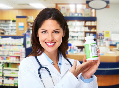 Photo: Pharmacist woman. Pharmacist woman.