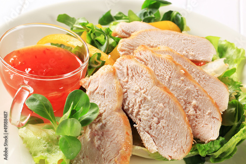 Photo: Sliced chicken breast with salad and sweet chilli sauce Sliced chicken breast with salad and sweet chilli sauce