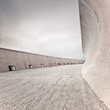 Concrete dike or dam structure, wall and floor, cloudy sky. Concrete dike or dam structure, wall and floor, cloudy sky.