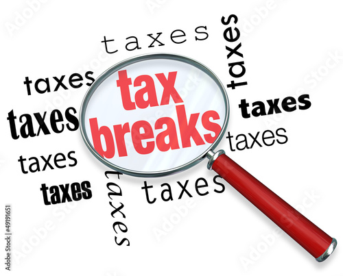 Illustration: How to Find Tax Breaks - Magnifying Glass How to Find Tax Breaks - Magnifying Glass