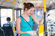 Pretty, young woman on a streetcar/tramway