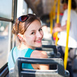 Pretty, young woman on a streetcar/tramway Pretty, young woman on a streetcar/tramway