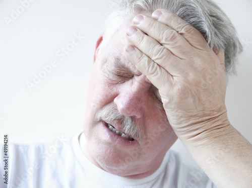 Photo: man with dizziness and head pain man with dizziness and head pain