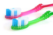 Two colorful tooth-brushes