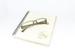 eyeglasses on notebook
