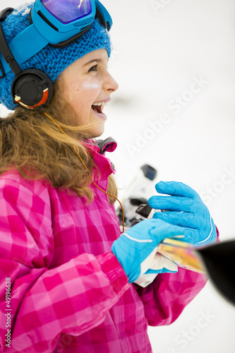Photo: Skiing, winter sports - portrait of happy young skier Skiing, winter sports - portrait of happy young skier