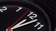Wristwatch with reverse motion arrows, clous-up