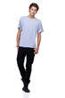 Handsome young guy standing against a white background - full-le